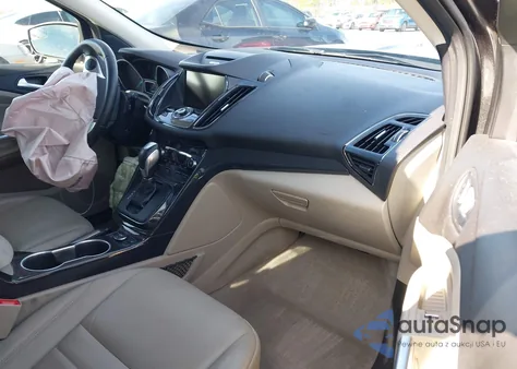 2015 Ford Escape Titanium z USA, uszkodzony, nr VIN 1FMCU0J97FUA98729